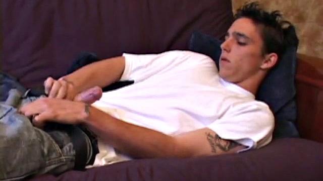 When young Sean Cage unzips his pants, he pulls out his stiff cock and goes to work on it. He gives himself a little head and then inserts sex toys up his ass, before stroking out a warm cum load onto his tummy.