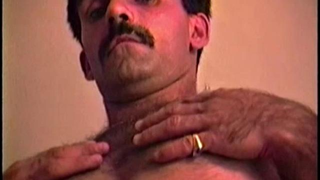 Stuck in traffic, I noticed Gabe. So, I thought "what the hell" and gave him my card. A few days later this handsome and hairy man is naked and stroking his hard uncut cock in my apartment.