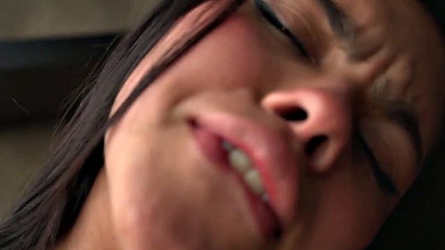 Lil Mia puts lotion on her nude body, exposing her medium breasts, rubbing herself while fingering her tight pussy to orgasm