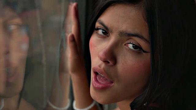 Lil Mia puts lotion on her nude body, exposing her medium breasts, rubbing herself while fingering her tight pussy to orgasm