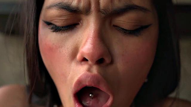 Lil Mia puts lotion on her nude body, exposing her medium breasts, rubbing herself while fingering her tight pussy to orgasm