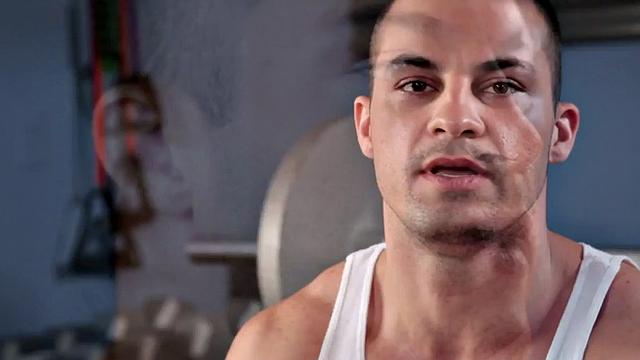 A muscular amateur stroke his cock in a public outdoor pool action