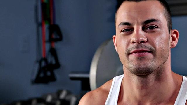 A muscular amateur stroke his cock in a public outdoor pool action