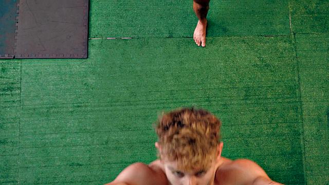 Eager muscled jock assfucks gym partner after rimjob