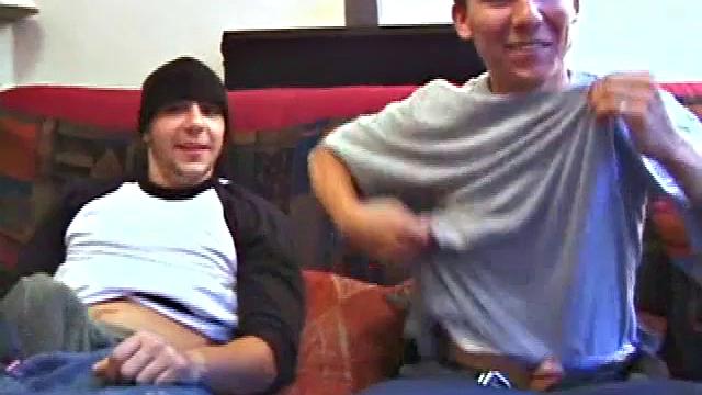 Brock Labelli and Bradley Shaw get naked and trade blow jobs on the sofa, before jerking off together. It's been a while since Brad has beat his meat, and he quickly shoots his load.