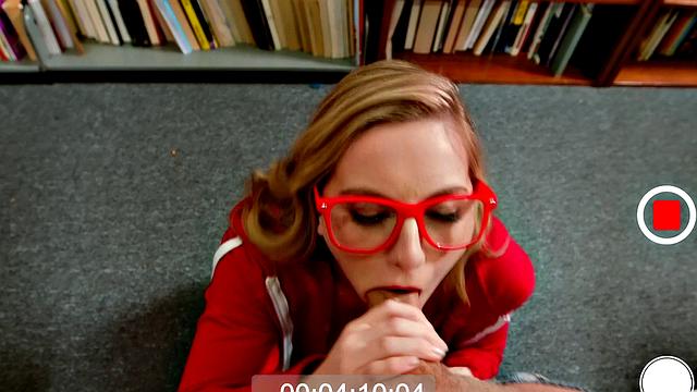 A busty bookworm give a sloppy handjob while getting her bald pussy drilled in cowgirl & doggystyle positions