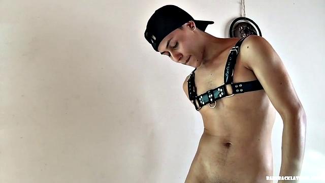 Zalar is a cute Latin twink, who has all his sex toys out for this solo jerk off. Standing, he works on a stiff one, while sampling one of his dildos. Then he smears oil all over his slim and smooth body, before getting back to the business at hand.