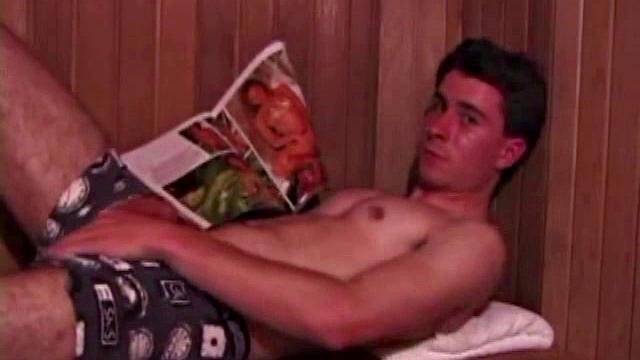 Eddy reclines in the sauna and looks at a porn magazine until a boner pops out of his shorts. Some serious stroking makes him bust a huge nut. Eddy then showers and poses naked for us.