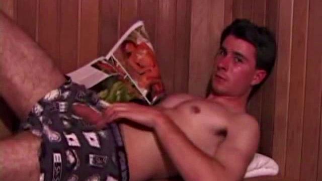 Eddy reclines in the sauna and looks at a porn magazine until a boner pops out of his shorts. Some serious stroking makes him bust a huge nut. Eddy then showers and poses naked for us.