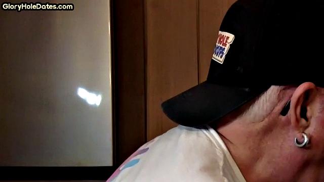 Gloryhole amateur DILF gives closeup blowjob and handjob