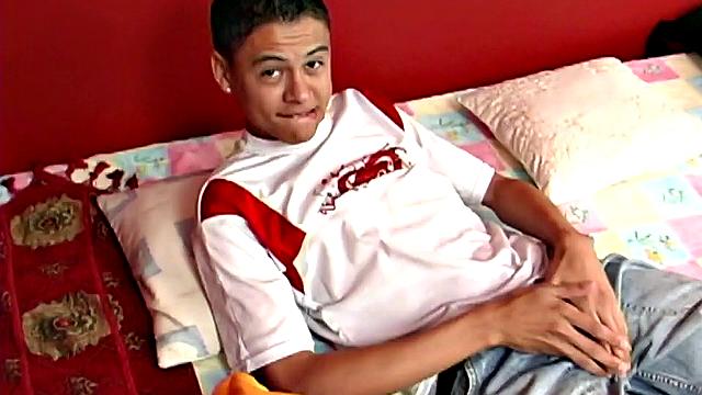 Latin twink Tato is a horny young man and he's on his bed to do something about it. He gropes his package, while stripping off his clothes, and is all boned up by the time he's naked.