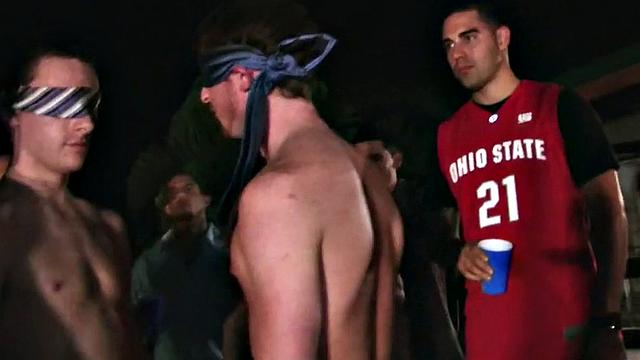 Blindfolded amateur waits outdoor for fraternity cum