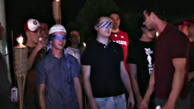 Blindfolded amateur waits outdoor for fraternity cum