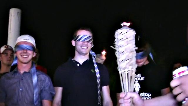 Blindfolded amateur waits outdoor for fraternity cum