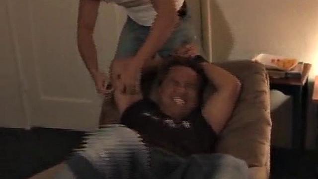 What do two tickle pros and their friend do on a boring Christmas day? They convince their cute Asian buddy to let them tie and tickle him. Azer gets tied to the recliner and tickled mercilessly by Mike and Ricky.