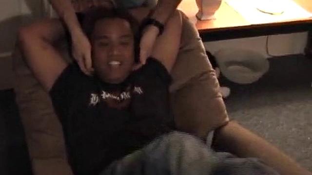 What do two tickle pros and their friend do on a boring Christmas day? They convince their cute Asian buddy to let them tie and tickle him. Azer gets tied to the recliner and tickled mercilessly by Mike and Ricky.