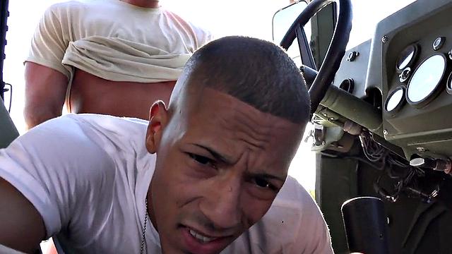 Military stud barebacked outdoors on army truck