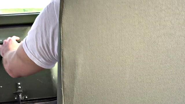 Military stud barebacked outdoors on army truck