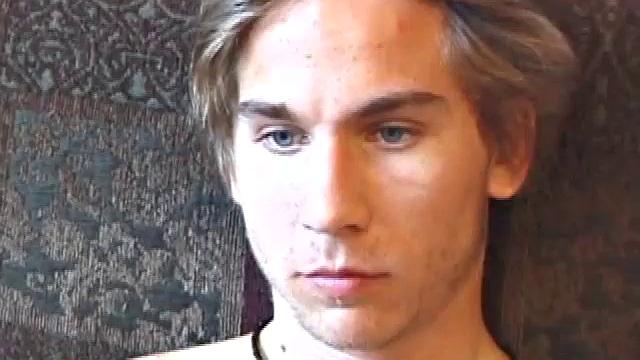 Naked and tuned into the porn video, scruffy Brock goes to work stroking his hard cock. After edging himself several times, the young man stands by the kitchen table and shoots a massive cum load on a cloth.