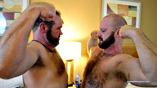 After a hard workout with the weights, Topher and MuscleBull admire each other and some real man-on-man muscle worship follows. These two oil each other up, and begin a different kind of workout.