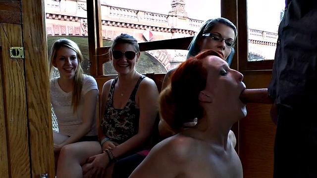 Ginger publicly sucking dom dick in kinky group