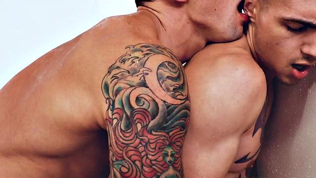 Tattooed stud rimmed and barebacked under shower to cum