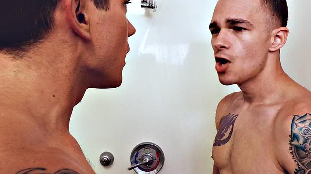 Tattooed stud rimmed and barebacked under shower to cum