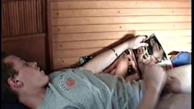 Calvin in Aft Cabin of Boat Reading Porn Magazine, Gets into Girl-on-Girl Action and Spunks Shirt