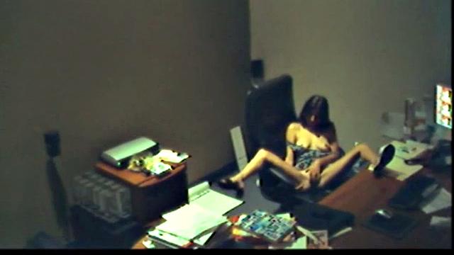 Horny babe mastirbating in office