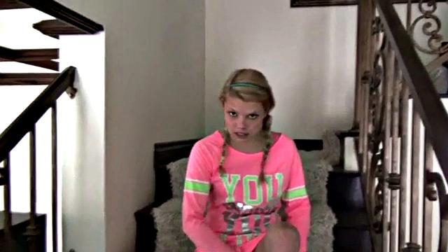 Shaved teen masturbates