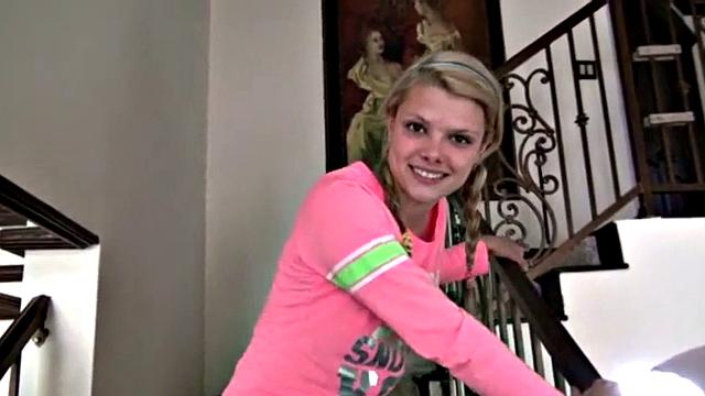 Shaved teen masturbates