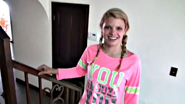 Shaved teen masturbates