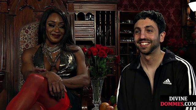 Strict black domme punishing cbt subject with kicking