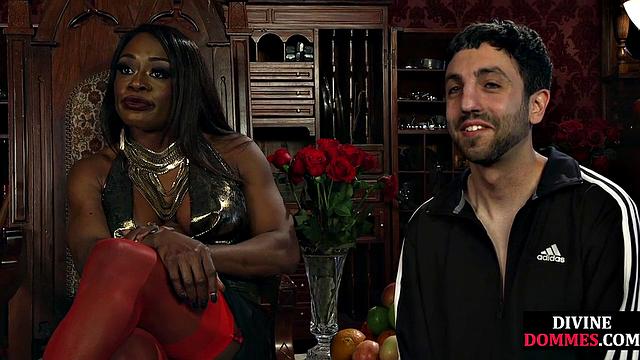 Strict black domme punishing cbt subject with kicking
