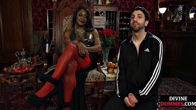 Strict black domme punishing cbt subject with kicking