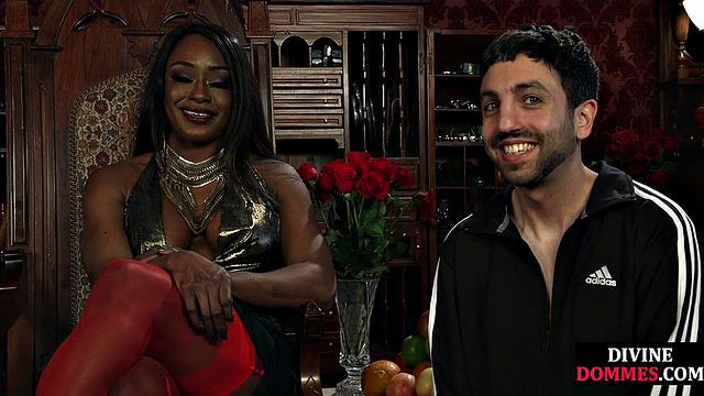 Strict black domme punishing cbt subject with kicking