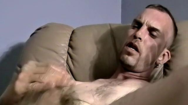 Ryan strokes his hairy cock for the camera