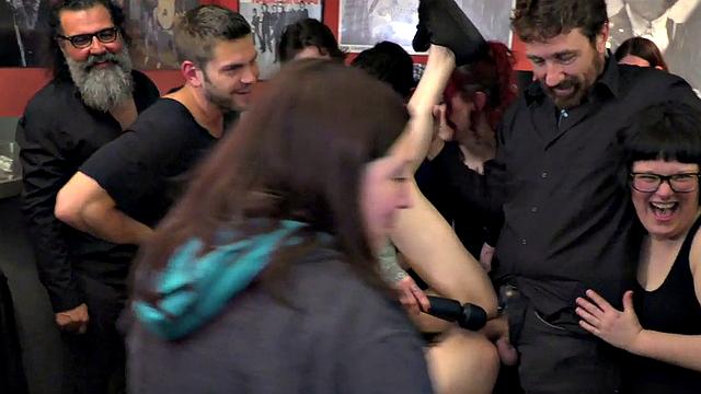 Watch this tattooed slut get humiliated and double penetrated in public by two hung guys