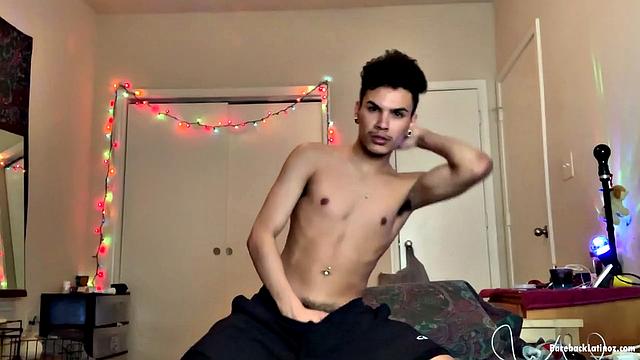 Latin boy Rio Rodriguez parks on a bed and strips to his underwear. After working up a boner, the young man gets naked and shoves a big fat dildo up his butt.