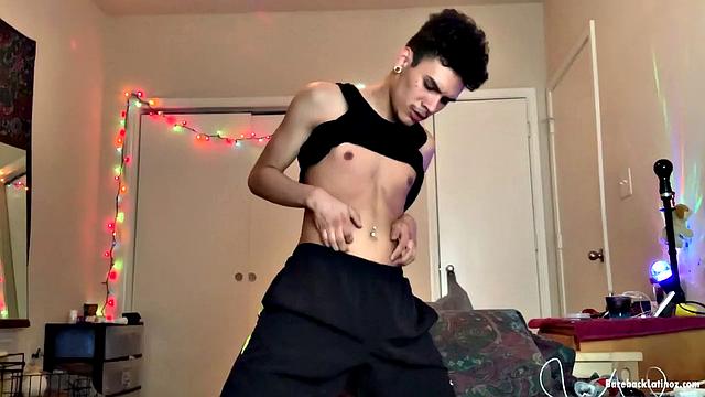 Latin boy Rio Rodriguez parks on a bed and strips to his underwear. After working up a boner, the young man gets naked and shoves a big fat dildo up his butt.