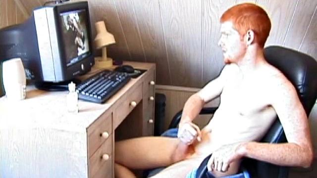 Seated in front of the computer, Tristian pulls out his cock, lubes it up and starts jacking off to the porn video playing. After showing us his butt, and working himself to the edge, Tristian pumps his load onto the computer screen.