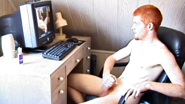 Seated in front of the computer, Tristian pulls out his cock, lubes it up and starts jacking off to the porn video playing. After showing us his butt, and working himself to the edge, Tristian pumps his load onto the computer screen.
