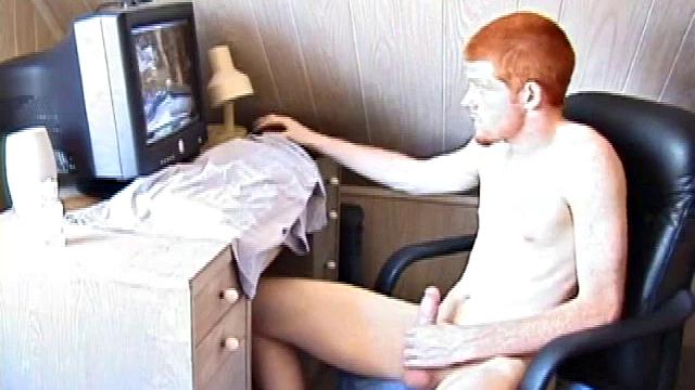 Seated in front of the computer, Tristian pulls out his cock, lubes it up and starts jacking off to the porn video playing. After showing us his butt, and working himself to the edge, Tristian pumps his load onto the computer screen.