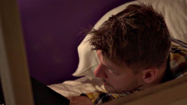 Busty tattooed babe fucked in hostel threesome