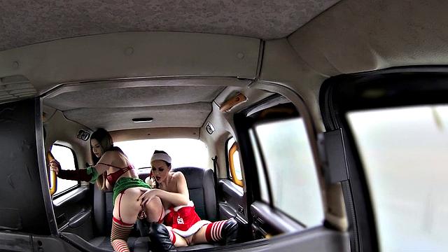 Young Santas in high heels kiss and scissor each other's small tits & tight asses for Christmas