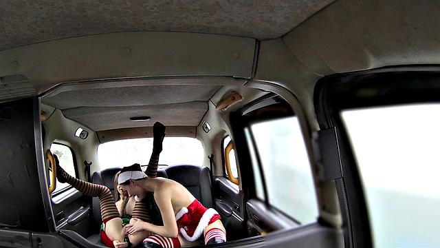 Young Santas in high heels kiss and scissor each other's small tits & tight asses for Christmas