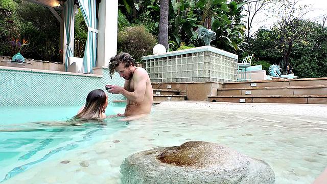 Watch skinny GF's tattooed pussy get pounded in reverse cowgirl by pool water toys