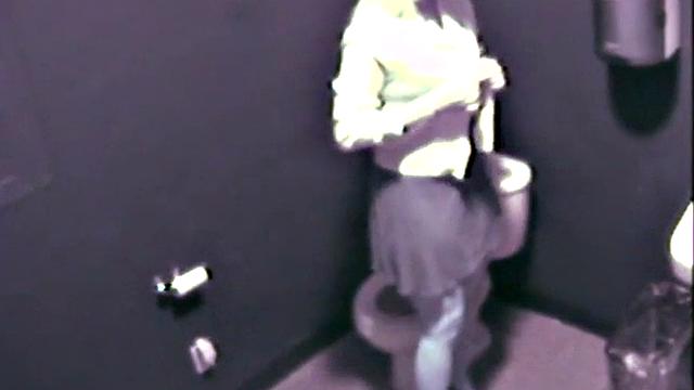 Sexy blonde fingering her pussy on the toilet