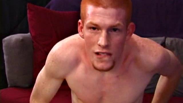Redheaded Tristian hot to jerk off: cute young guy naked stroking his cock and gyrating on the couch