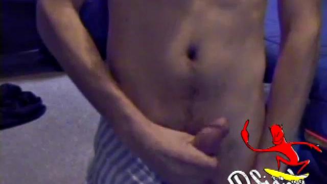 Ric is practically naked when we find him down on the floor watching a porn video. Shaking his big cock at the camera, he asks if we like it. This dark haired boy lathers his cock in lube and really enjoys massaging it in and over his balls.